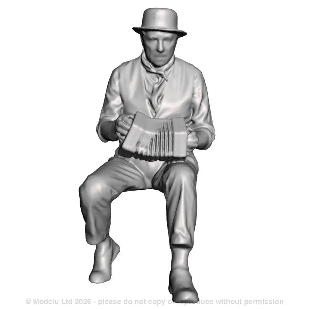 A male concertina player seated