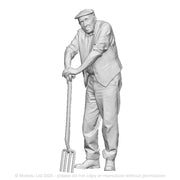 A male gardener with fork