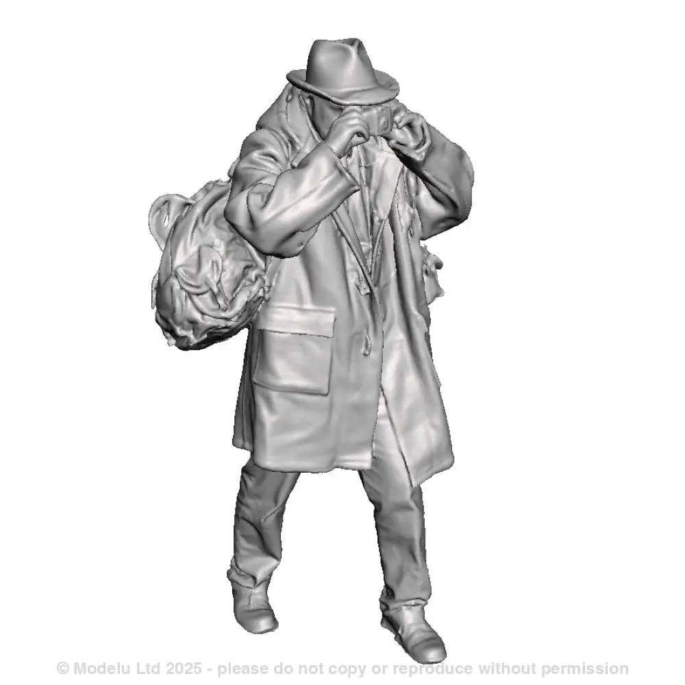 A male photographer with kodak brownie