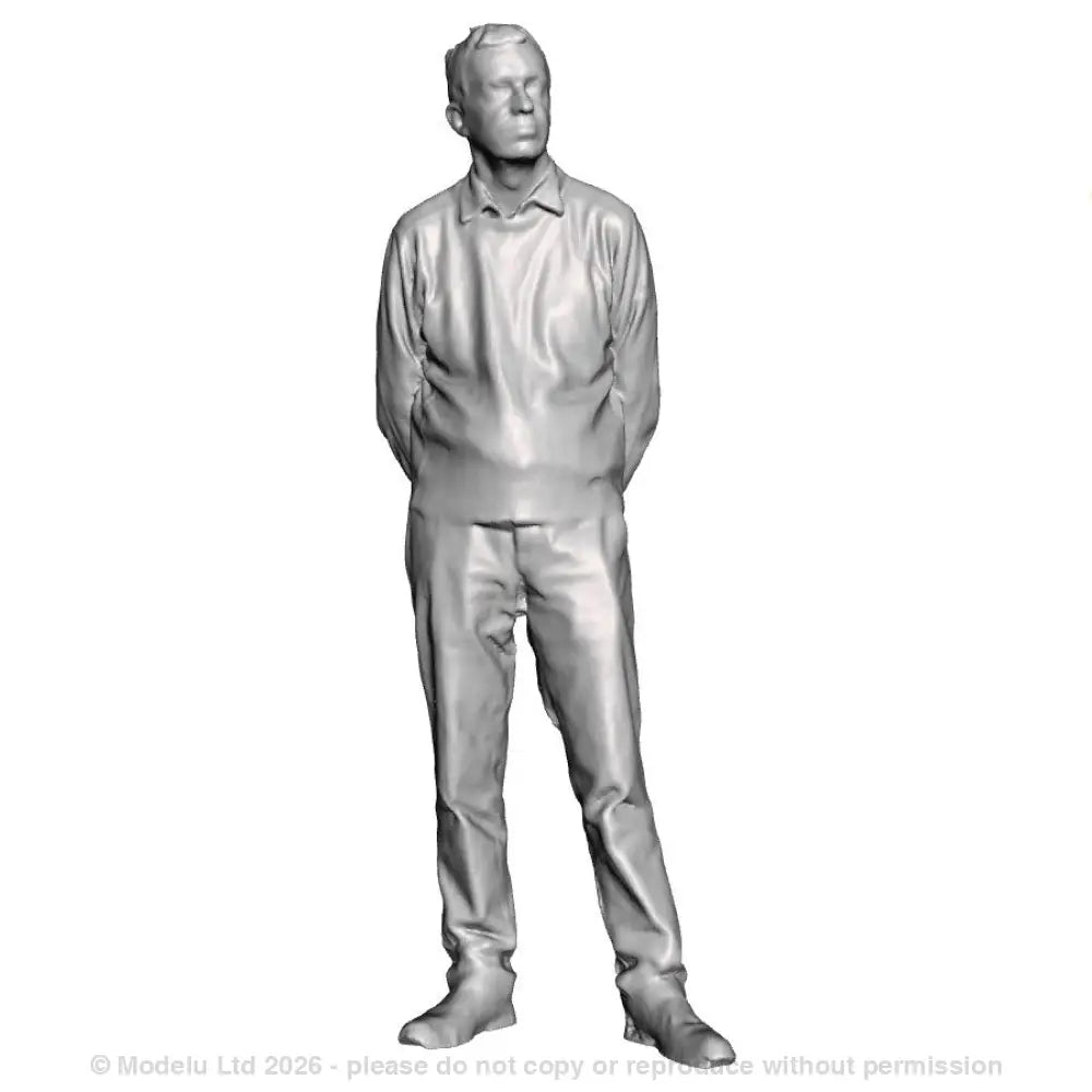 A male figure with hands behind back