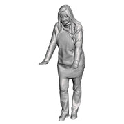A female shop keeper leaning