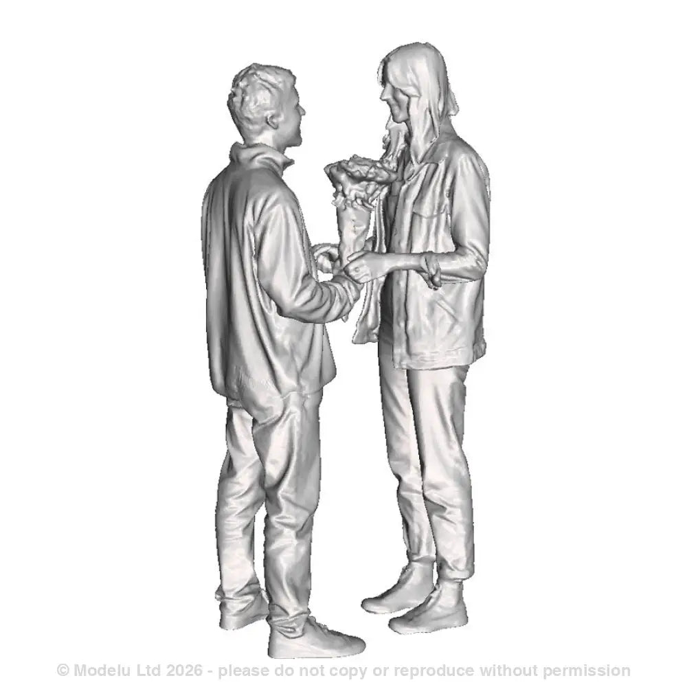 A male and female couple with flowers