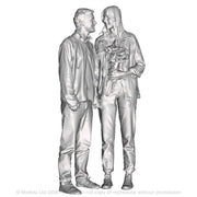 A male and female couple with flowers