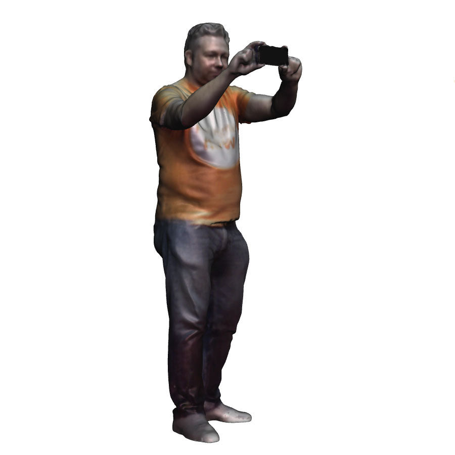 A male figure using a mobile phone