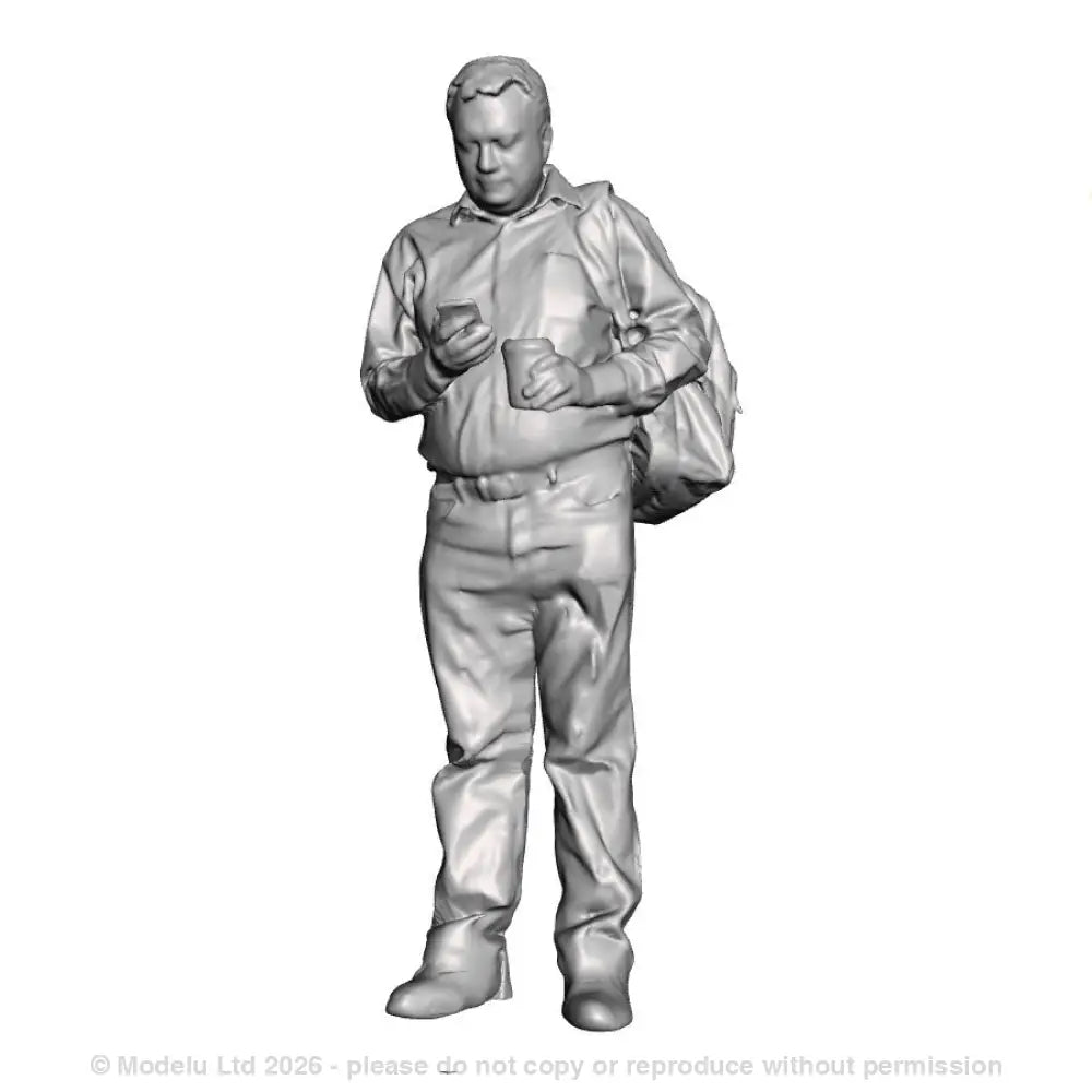 A male figure using a mobile phone