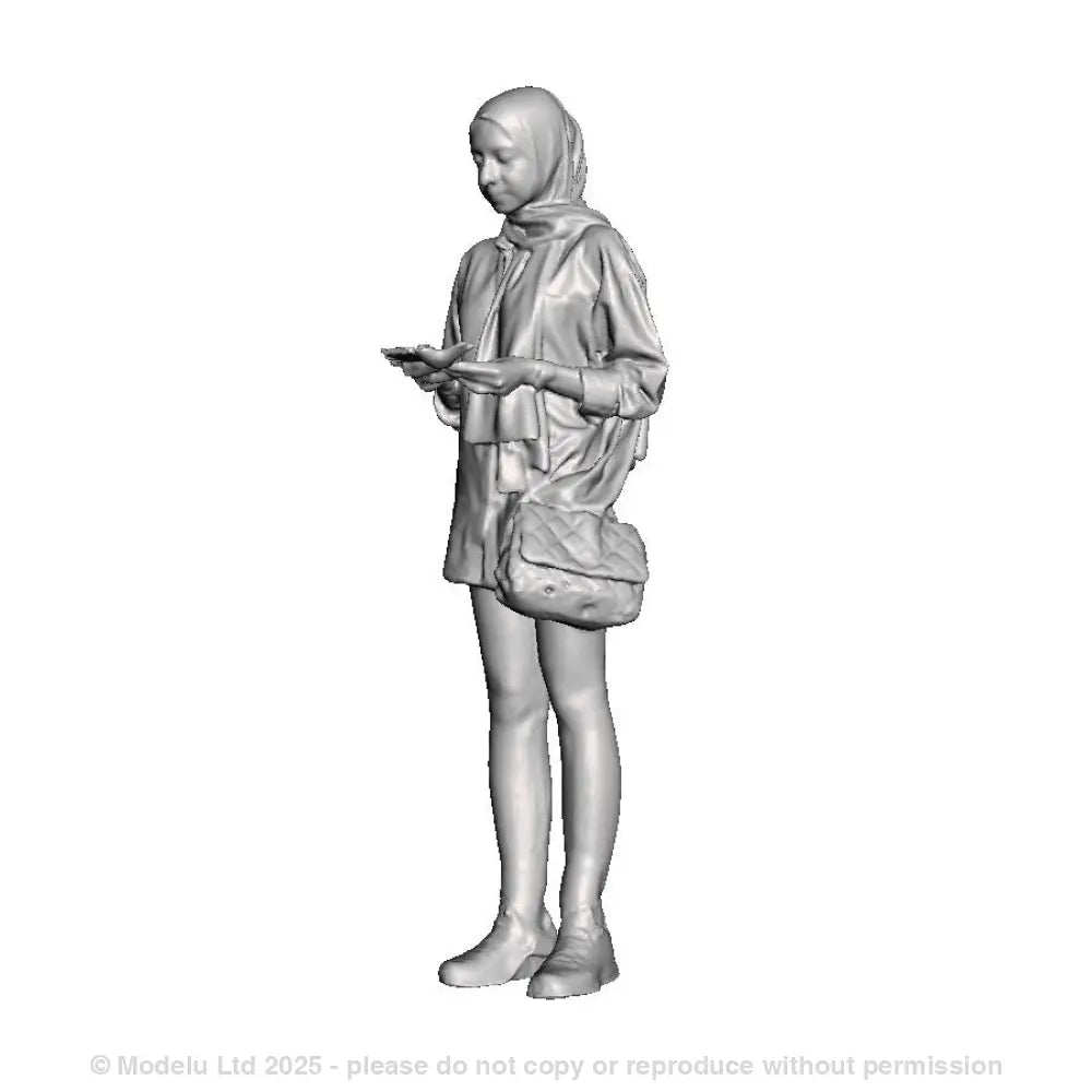 A female figure using an ipad