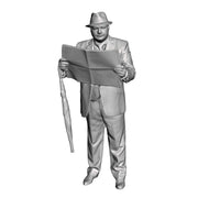 A male figure reading a newspaper