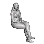 A female figure seated