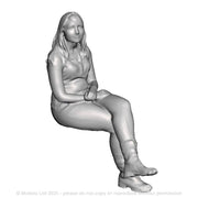 A female figure seated