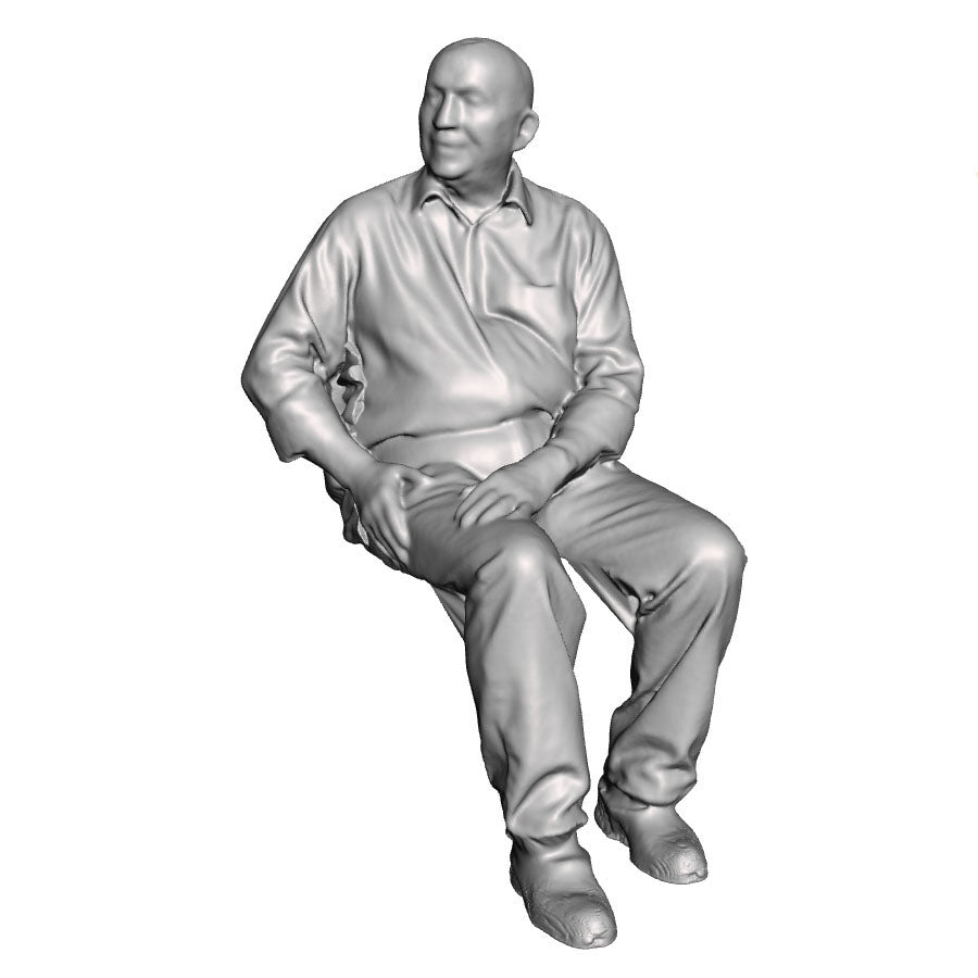 A male figure seated