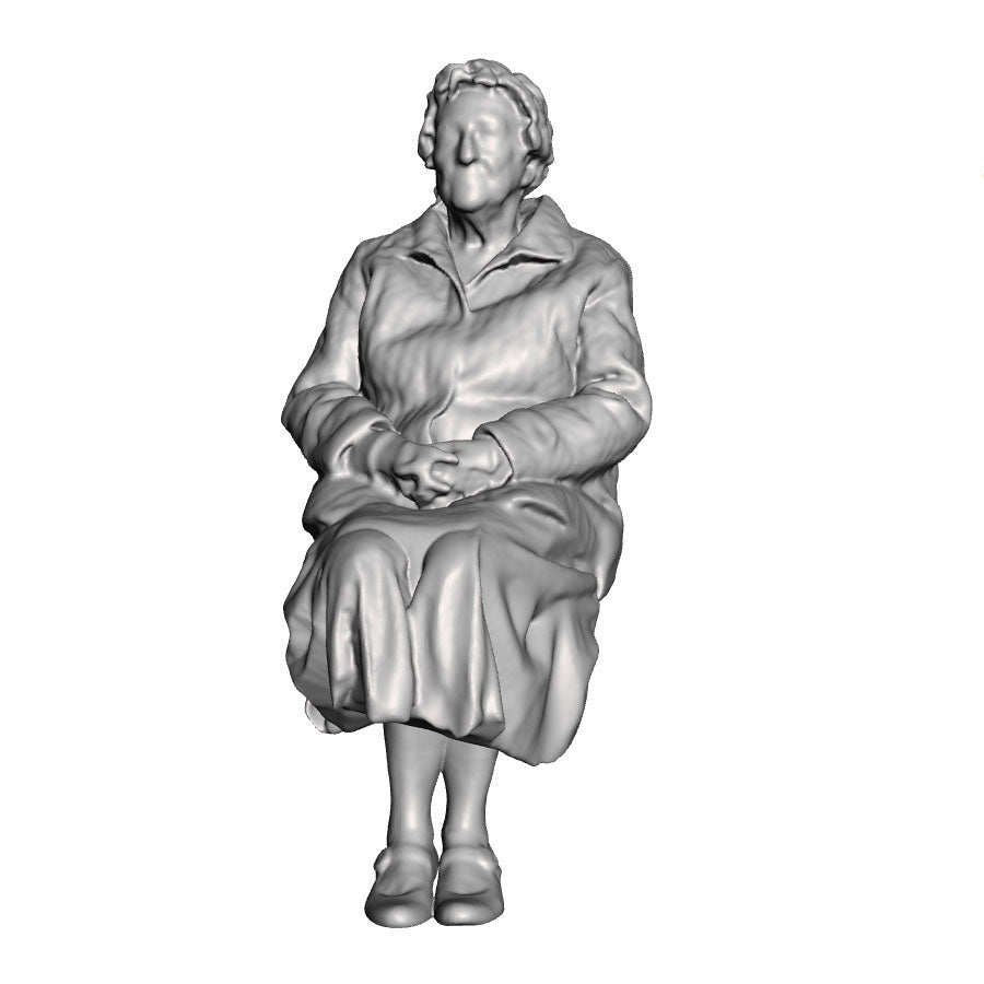 A female figure seated