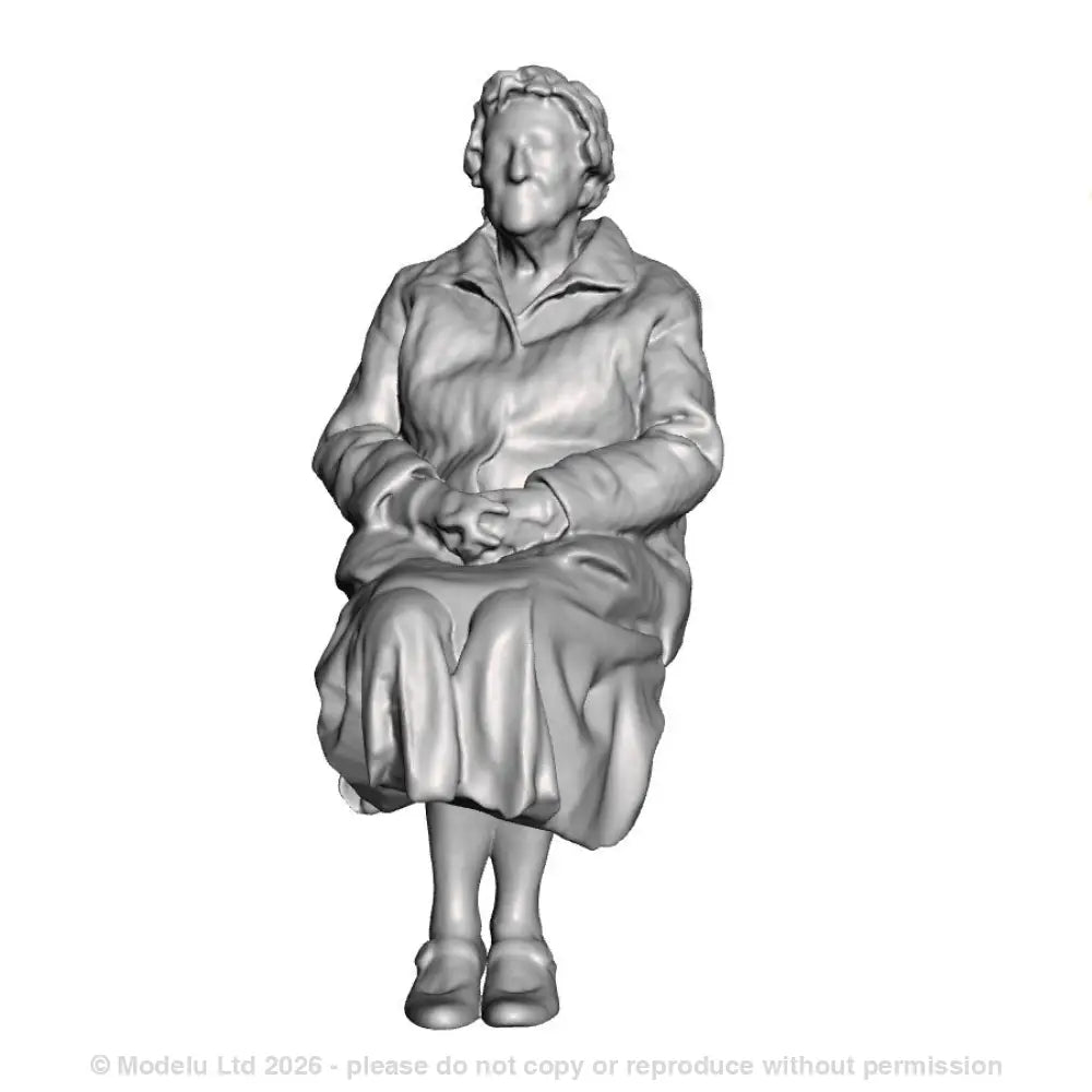 A female figure seated