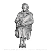 A female figure seated