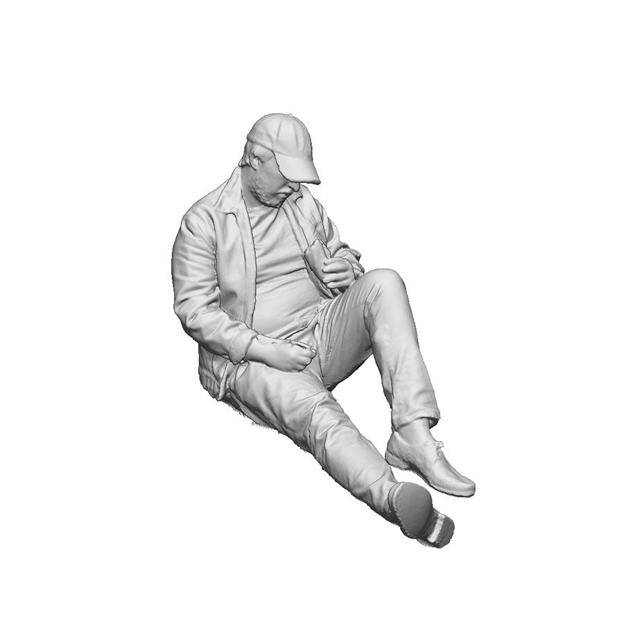 A seated man eating