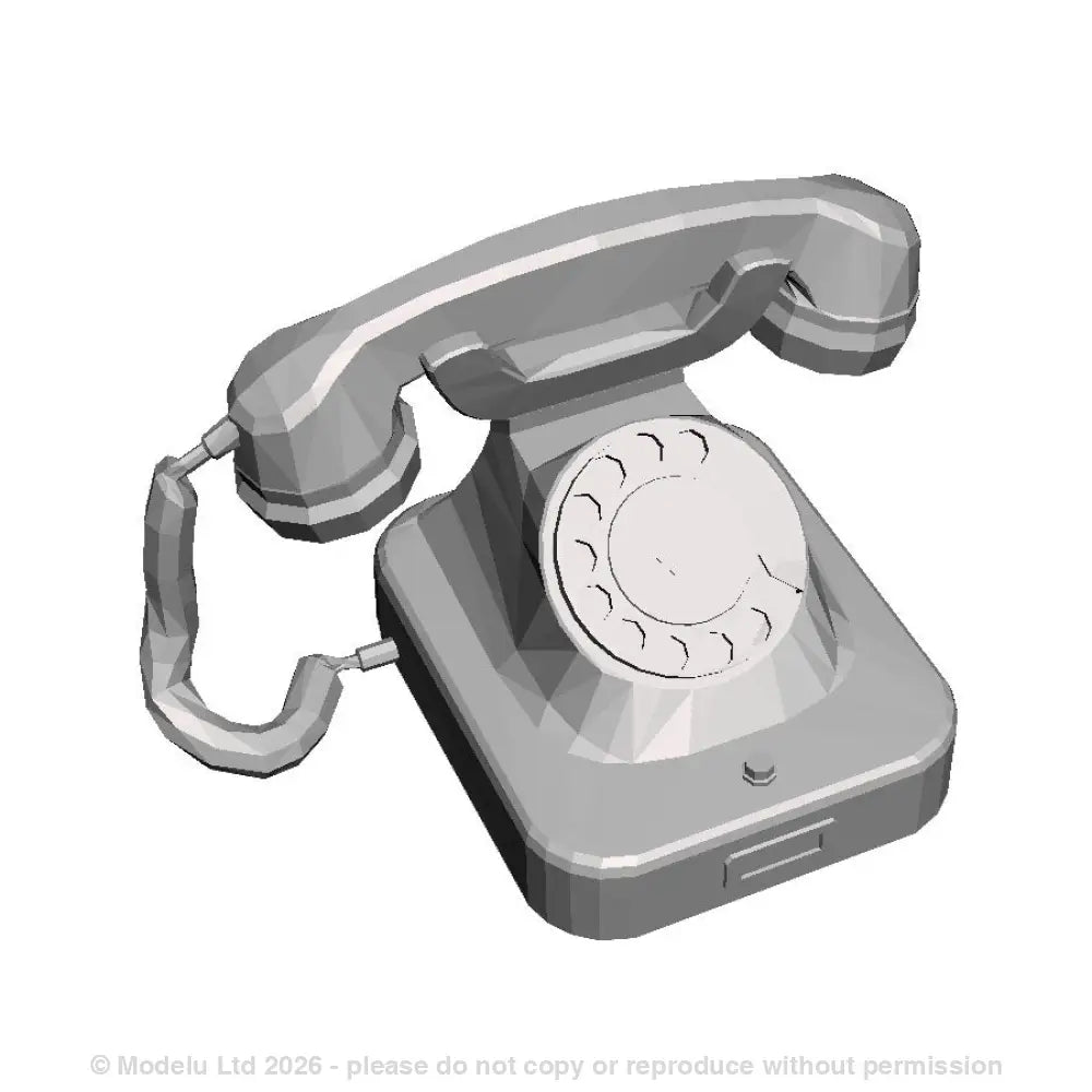 A set of bakerlite rotary dial telephones